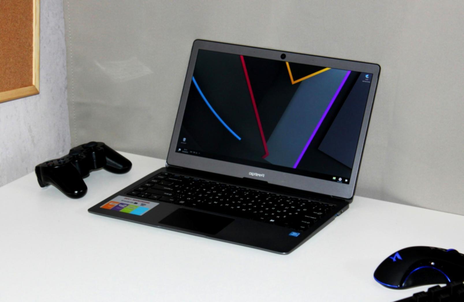 Student working on 3D physics simulation project in lab environment