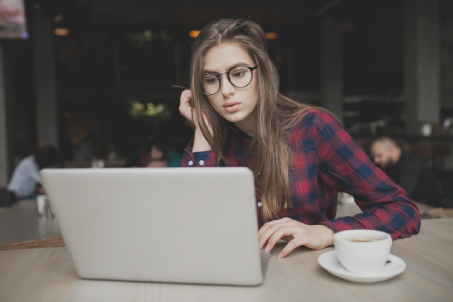 Student working on physics simulation code for 3D game environment